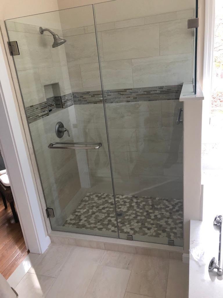 Finished glass shower remodeled by Empire Home Services